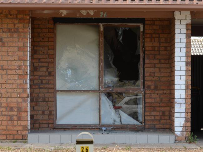 DECEMBER 8, 2021: A housing Trust home at 26 Cumberland Crescent, Huntfield Heights where a neighbour broke a window and set fire to furniture. Picture: Brenton Edwards