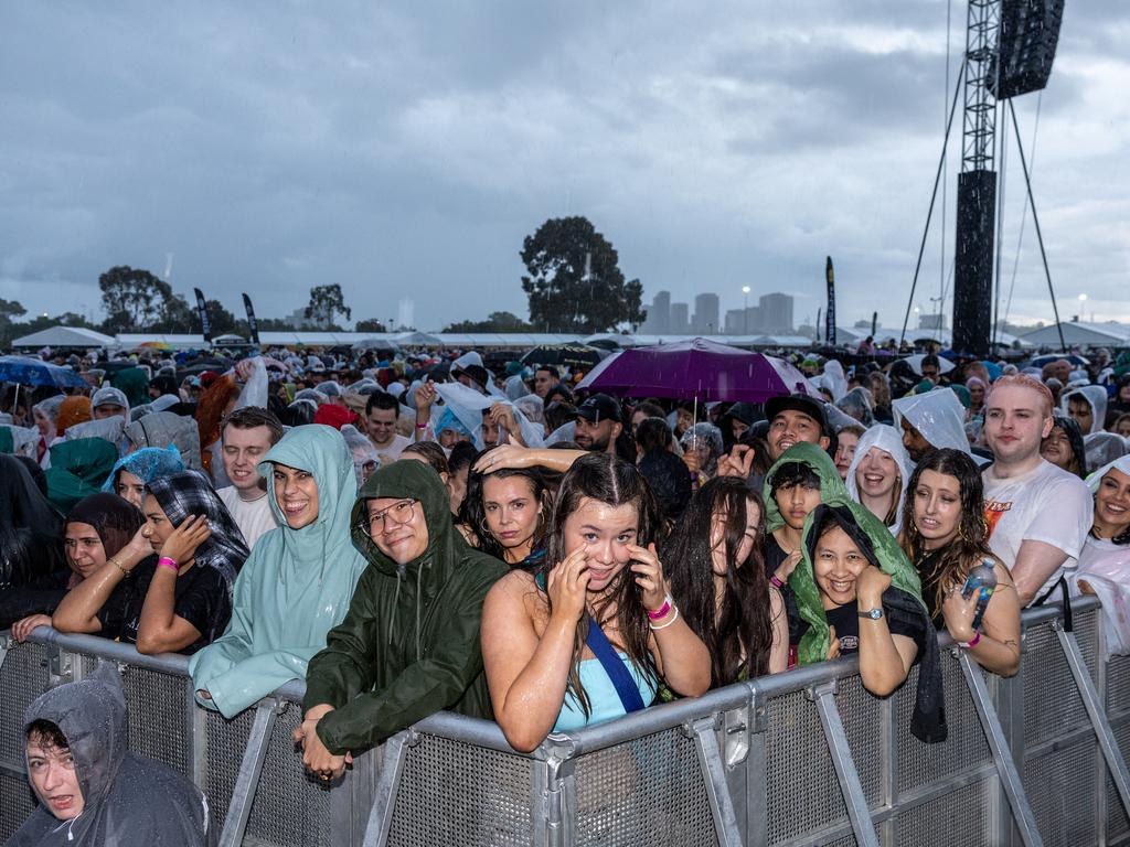 The rain didn’t dampen the crowd’s spirits. Picture: Jason Edwards