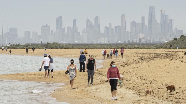 People visiting Brighton Beach on Sunday. Picture: NCA NewsWire/Daniel Pockett