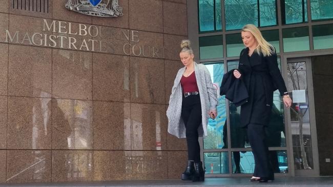 Lawyer Lauren Tye (right) and a supporter leave the Melbourne Magistrates' Court after Steven Mauldon, 33, appeared on explosives and bomb hoax charges. Picture: NewsWire/ Liam Beatty