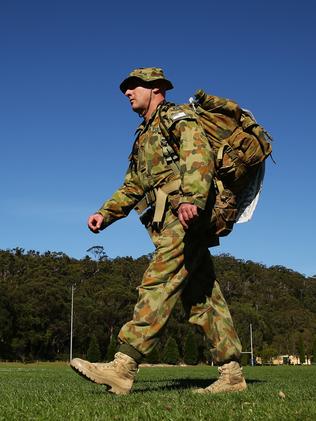 Aussie soldier Andrew Summers marching on Manly Beach for silent ...
