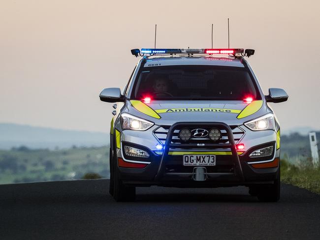 Two injured as car towing caravan rolls on major highway
