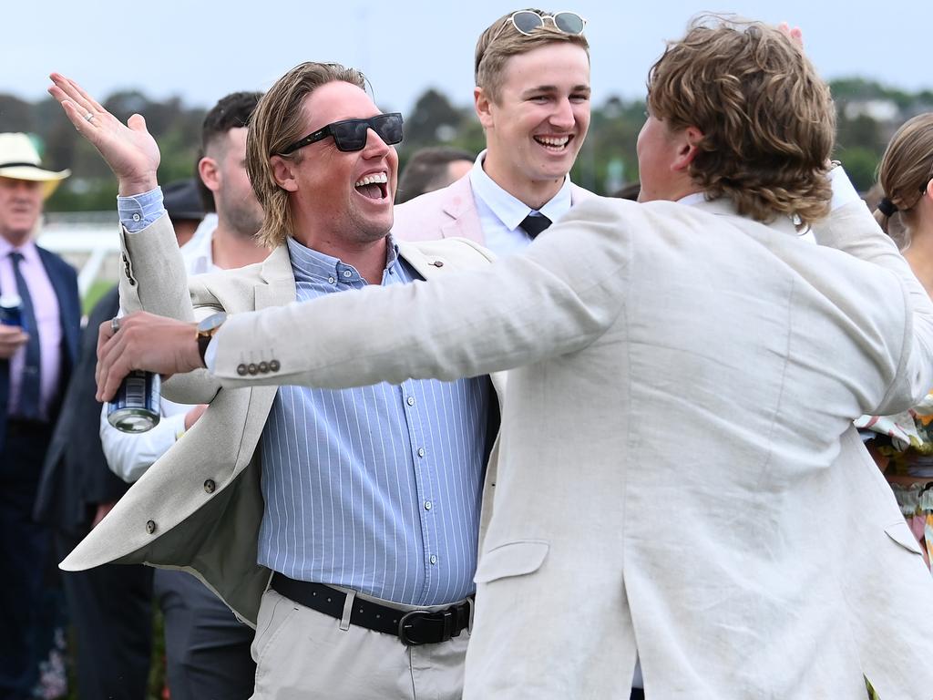 GOOD TIMES: Fans celebrate as White Marlin wins race two. Picture: Quinn Rooney / Getty Images