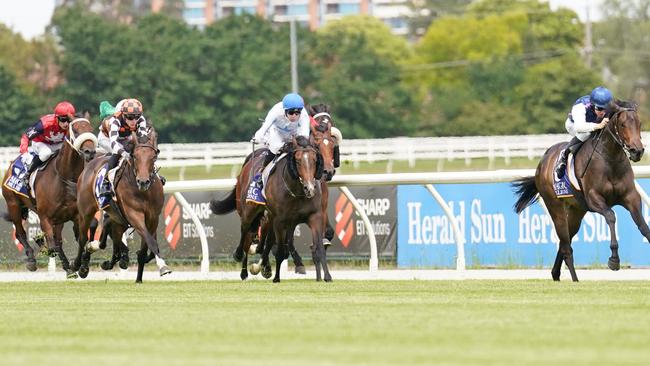 Invincible Woman streeted the field but Zouclaire (orange and black) finished off nicely. Picture: Picture: Scott Barbour/Racing Photos via Getty Images