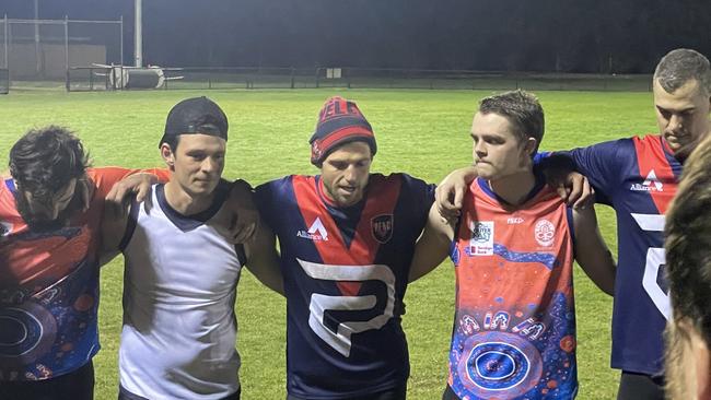 Powelltown player coach Jarrod Bayliss, centre, peps up his troops at training ahead of last season’s grand final. Picture: Kiel Egging.