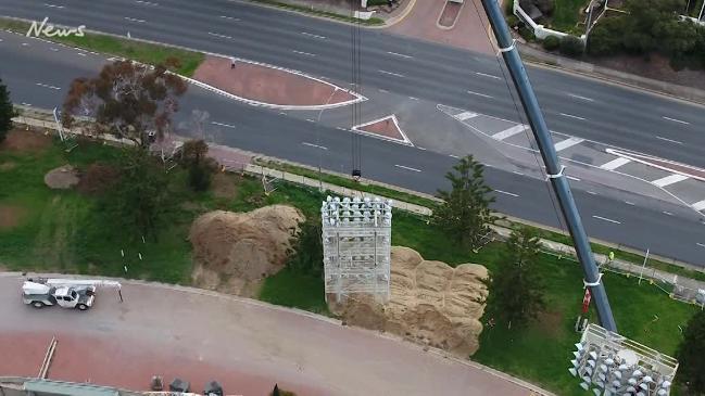 Lights come down at Football Park