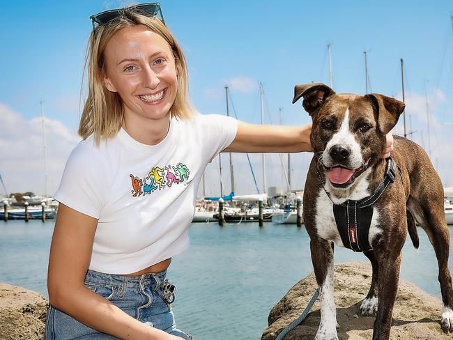 Madi and her dog Minka were rescued by Search and Rescue and Water police yesterday in the Werribee river during huge rainfalls over the Christmas period. Picture: Ian Currie