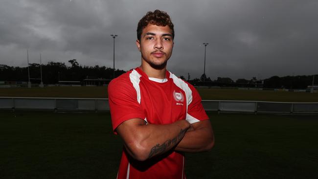 Palm Beach Currumbin's Xavier Savage poses for a picture at Pizzey Park Burleigh. Photograph : Jason O'Brien