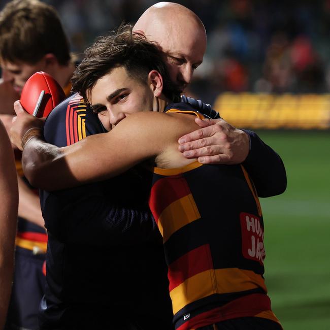 Matthew Nicks congratulates Josh Rachele after the Brisbane win. Picture: James Elsby/AFL Photos via Getty Images