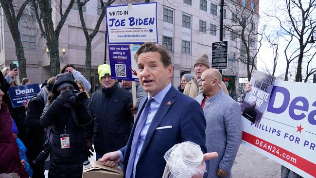 Dean Phillips brings coffee to a Joe Biden write-in rally in Manchester at the weekend. Picture: AFP