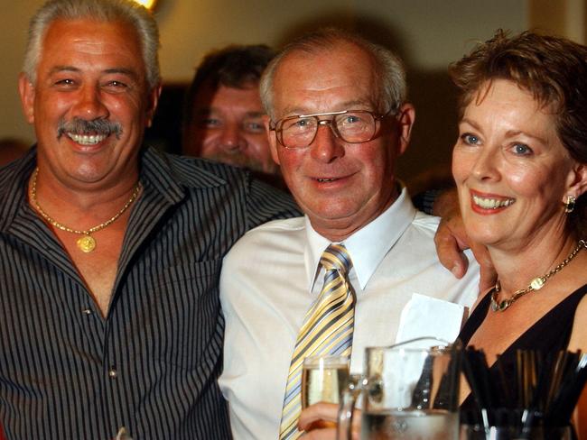 Disgraced former detective Roger Rogerson, centre, with wife Anne Melocco and friend Graeme 'Abo' Henry at the Rag and Famish Hotel in North Sydney after the couple's Sydney Registry wedding ceremony in 2004.