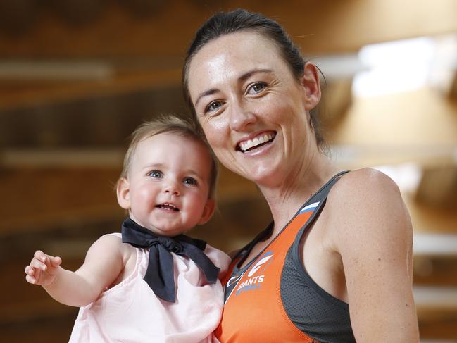 NSW Swift's Netballer Bec Bulley pictured with daughter Indie who will travel with her in the new netball league.