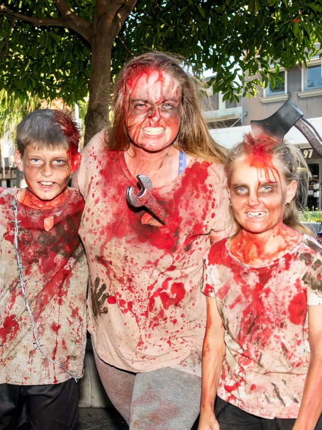 Trent Day, Krystle Davy and Eryn Day from Walkerston at Mackay Charity Zombie Walk. Saturday, October 30, 2021. Picture: Michaela Harlow