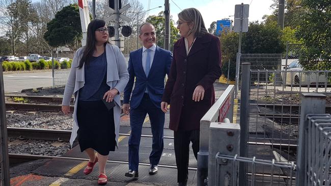 Eastern Victoria Region state Labor MP Harriet Shing, Monbulk state Labor MP James Merlino and Public Transport Minister Jacinta Allan at the Mooroolbark level crossing on Manchester Rd. Picture: Kiel Egging