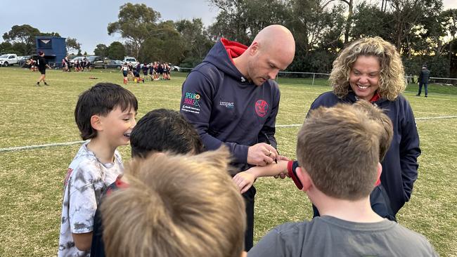 Mt Eliza president Cass Clayton with Nathan Jones.