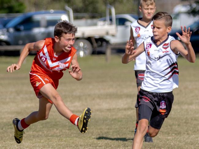 SWANS POWER: Lismore Swans U11 player Harvey Power was a ball of energy and showed great form during the match against the Burleigh Bo,\\mbers White. Photo: Daniel Cohen