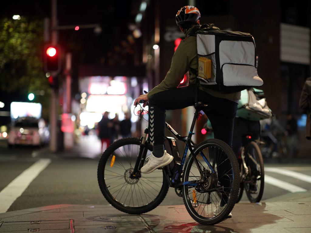 Pictured in Surry Hills is a rider on his food bike delivery.Picture: Christian Gilles