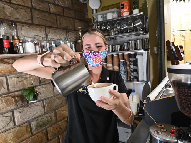 The Tap on Mitchell street is open for business and the coffee is ready says barista Leah Gregory-Bader. Picture Julianne Osborne