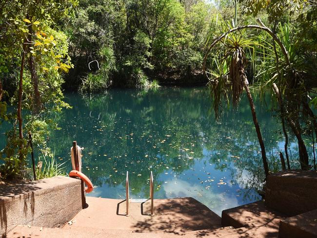 Ashleigh Smith, 22 of Darwin, and Dylan Moore, 22 are visiting Darwin from Townsville and were informed they couldn't swim at Berry Springs Nature Park because a large saltwater crocodile was spotted at the lower weir close to the springs last night.