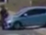 Still shot of CCTV on Hedges Ave shows a car hitting a cyclist in the bidirectional bike lane. Picture: Supplied