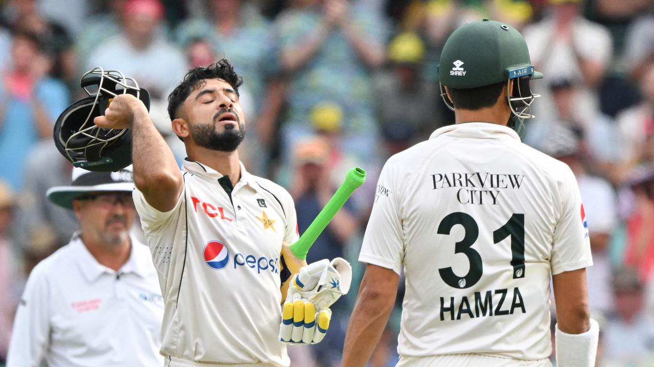 Aamir Jamal celebrates after reaching his half-century. Picture: AFP