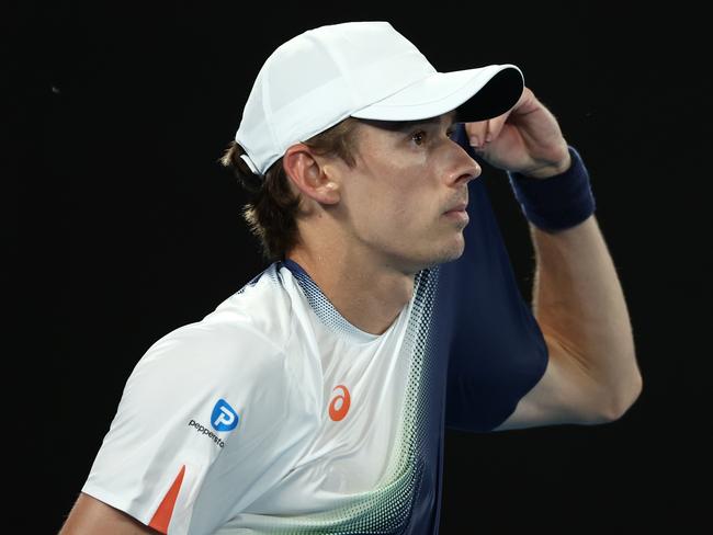 MELBOURNE, AUSTRALIA - JANUARY 20: Alex de Minaur of Australia reacts against Alex Michelsen of the United States in the Men's Singles Fourth Round match during day nine of the 2025 Australian Open at Melbourne Park on January 20, 2025 in Melbourne, Australia. (Photo by Graham Denholm/Getty Images)