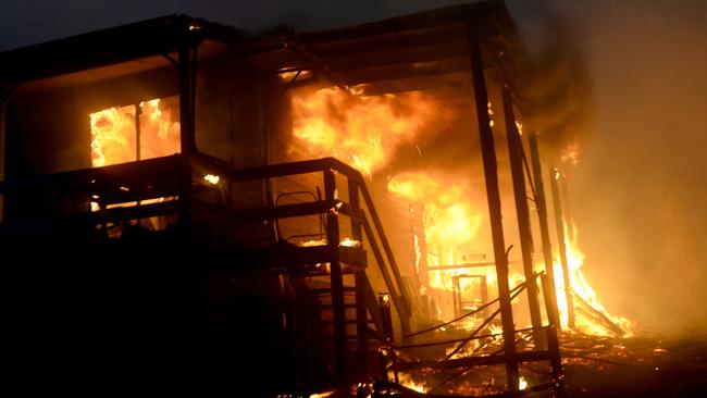 This home was completely destroyed by the firestorm last night. Picture: Jeremy Piper