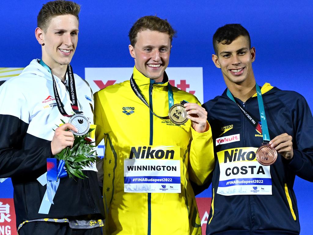 Aussie gold medallist Elijah Winnington on victory dais with the minor placegetters. Picture: Getty Images