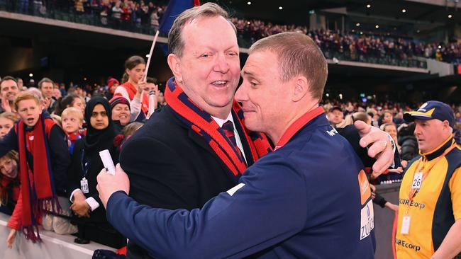 Glen Bartlett and Simon Goodwin embrace after a Melbourne win in 2018. Picture: Getty Images