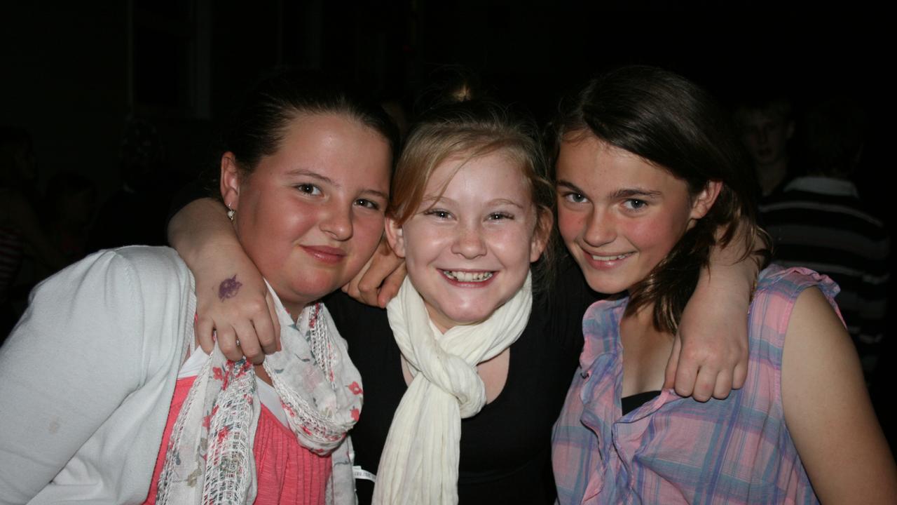 Lauren Waller, Laryssa Smith and Brittany Keogh dressed to party at the Blue Light disco. Photo Deanna Millard / Warwick Daily News