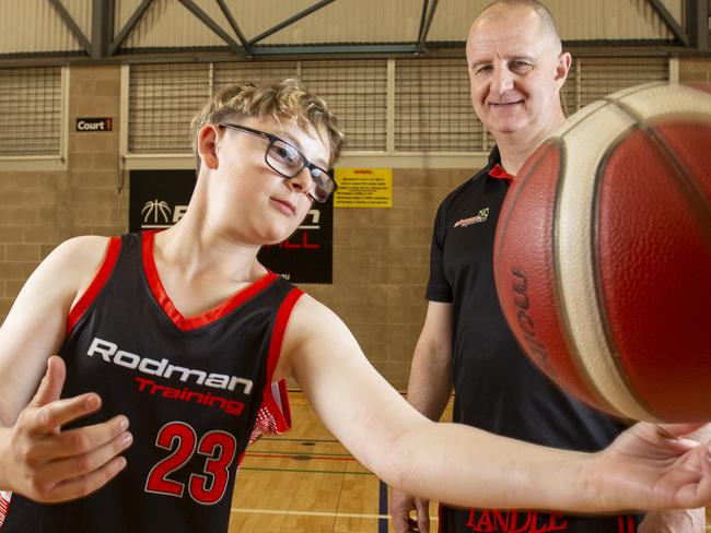 Rodman basketball coach Roddy Dowdell with student, Jackson Penal 12. Rodman Basketball Club has been an integral part of Jackon's improvement as he has lvl 2 autism. Rodman has been nominated as SA's best junior sports coach. 15th November 2024 Picture: Brett Hartwig