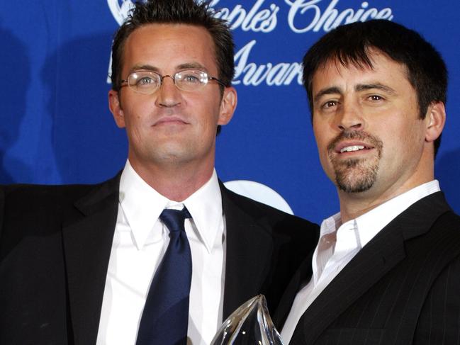 Matthew Perry and Matt LeBlanc pose backstage during the 30th Annual People's Choice Awards at the Pasadena Civic Auditorium January 11, 2004 in Pasadena, California. (Photo by Carlo Allegri/Getty Images)