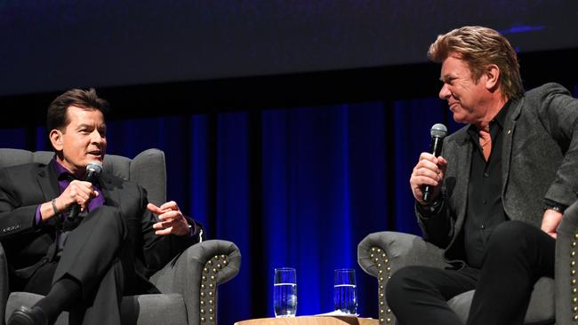 American actor Charlie Sheen during An Evening With Charlie Sheen live show, hosted by Richard Wilkins, at Melbourne Convention Centre. His main reason for visiting Australia for the tour was revealed by the Gold Coast Bulletin: He was getting a rumoured $500,000 to star in a controversial Ultra Tune ad. (AAP Image/Penny Stephens)