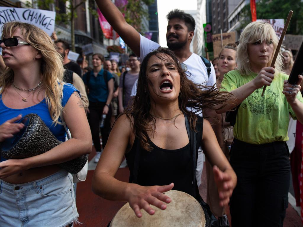 A woman is pictured at a climate action rally in Sydney, on Friday, January 10, 2019. (AAP Image/Michael Bilbe-Taylor)