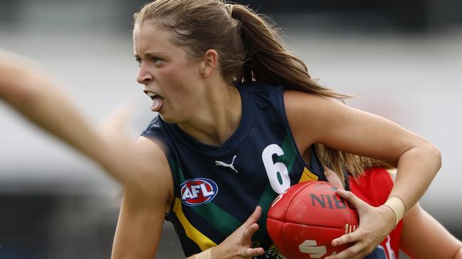 MELBOURNE, AUSTRALIA - APRIL 06:  Sara Howley of the AFL National Academy Girls runs with the ball during the Marsh AFL National Academy Girls vs U23 All-Stars at Ikon Park on April 06, 2024 in Melbourne, Australia. (Photo by Darrian Traynor/AFL Photos/via Getty Images)