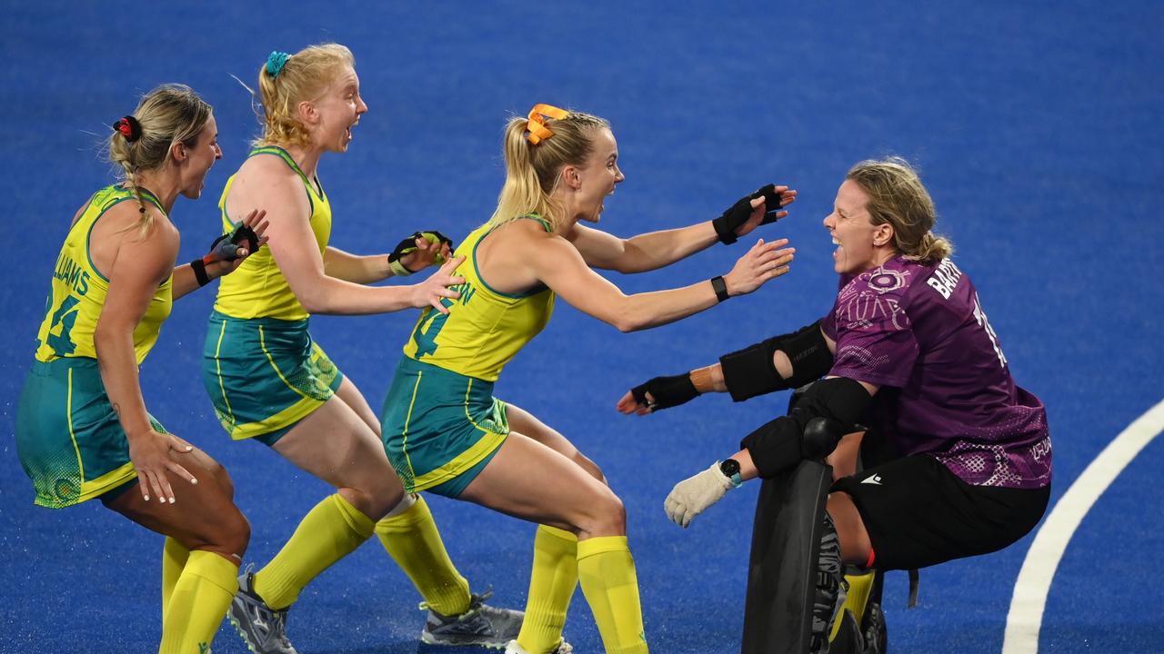BIRMINGHAM, ENGLAND - AUGUST 05: Jocelyn Bartram (R) of Team Australia is congratulated by teammates following victory in the Women's Hockey Semi-Final match between Team Australia and Team India on day eight of the Birmingham 2022 Commonwealth Games at University of Birmingham Hockey &amp; Squash Centre on August 05, 2022 on the Birmingham, England. (Photo by Alex Davidson/Getty Images)