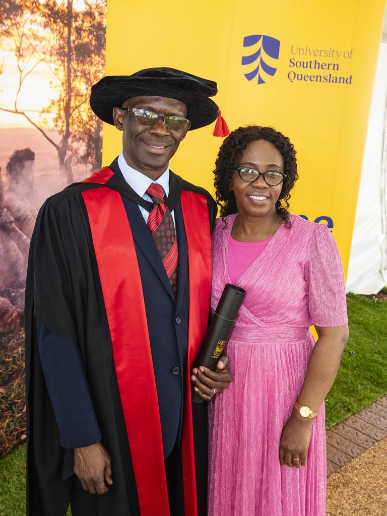 Doctor of Health Economics graduate Chijioke Okoli with wife Lilian Okoli at the UniSQ graduation ceremony at Empire Theatres, Tuesday, December 13, 2022.