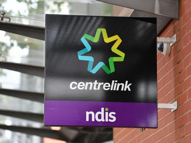 A close up of a Centrelink sign in Norwood, Adelaide. Thursday, April 16, 2020. The Australian Government has announced even tighter restrictions around social gatherings, and boosted stimulus spending, in attempts to fight off the coronavirus and it's affects on the economy. (AAP Image/David Mariuz) NO ARCHIVING