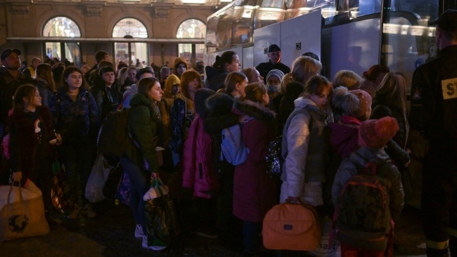 Thousands of Ukrainians have been boarding buses to flee towns and cities for neighbouring countries as the war heads into its fifth week. Picture: Jeff J Mitchell/Getty Images