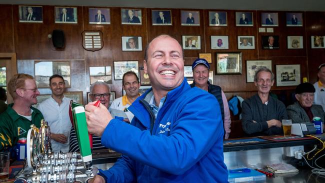 Josh Frydenberg visits the Auburn Bowls Club where he meets with constituents, fulfils an election promise by shouting the bar and has a game of bowls. Picture: Jake Nowakowski