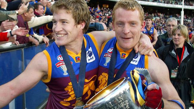 Luke Power and Michael Voss with the 2003 premiership cup.