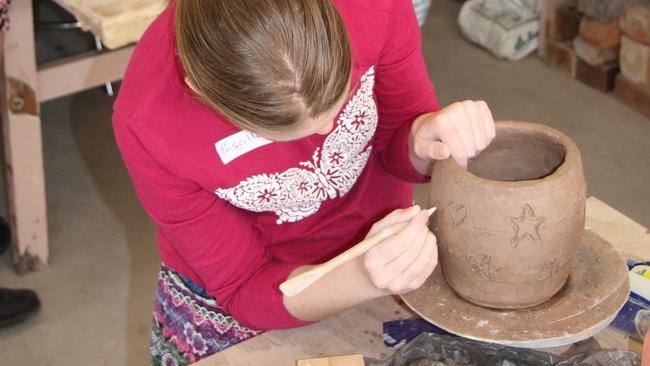 From clay to object at a pottery workshop.