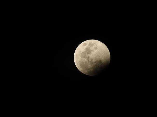 The lunar eclipse from Newcastle, NSW. Picture: Justin Sanson