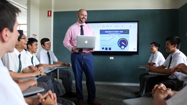 Parramatta Marist High vice principal Gavin Hays with some of his students. Picture: James Croucher