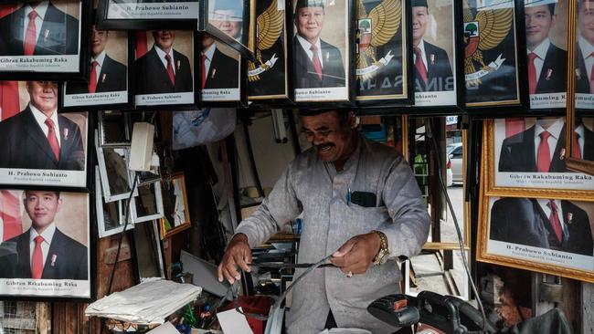 Portraits of Indonesia's President Prabowo Subianto and Vice-President Gibran Rakabuming Raka in the shop of a street vendor in Banda Aceh, Indonesia, last week. Picture: AFP