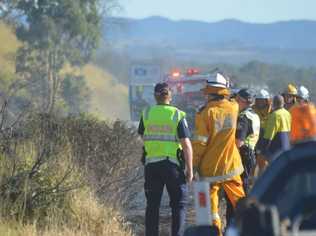 Emergency services attend a grass fire on the Warrego Hwy at Plainland. Photo Derek Barry / Gatton Star. Picture: Derek Barry