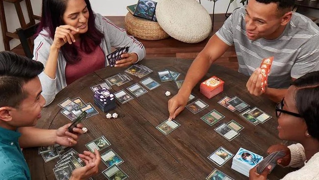 A game of Magic: The Gathering at a home table. Picture: Wizards of the Coast