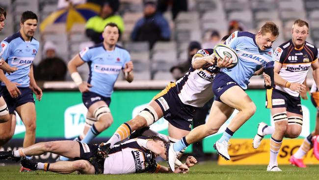 NSW’s Joey Walton crashes through a tackle against the Brumbies. Picture: Getty Images