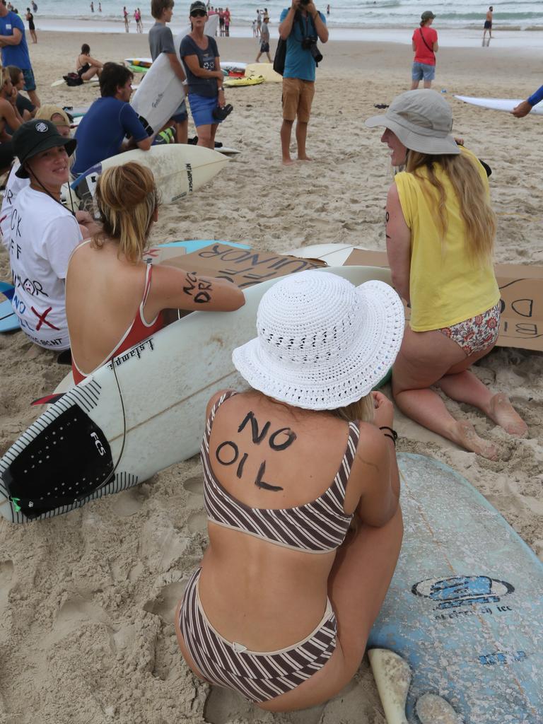 Protest at Burleigh against an oil company drilling in the Great Australian Bight. Elise Milner of Byron Bay (white Hat). Pic Mike Batterham.