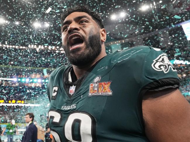 Philadelphia Eagles tackle Jordan Mailata celebrates after defeating the Kansas City Chiefs in the NFL Super Bowl 59 football game, Sunday, Feb. 9, 2025, in New Orleans. (AP Photo/Doug Benc)